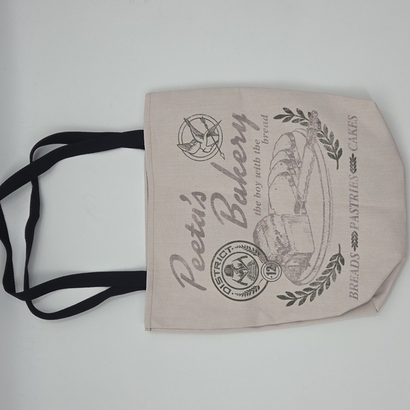 The Hunger Games Peeta's Bakery Cream Tote Bag - Picture 12 of 16